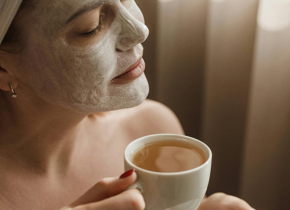 young-woman-having-face-massage-relaxing-spa-salon 1